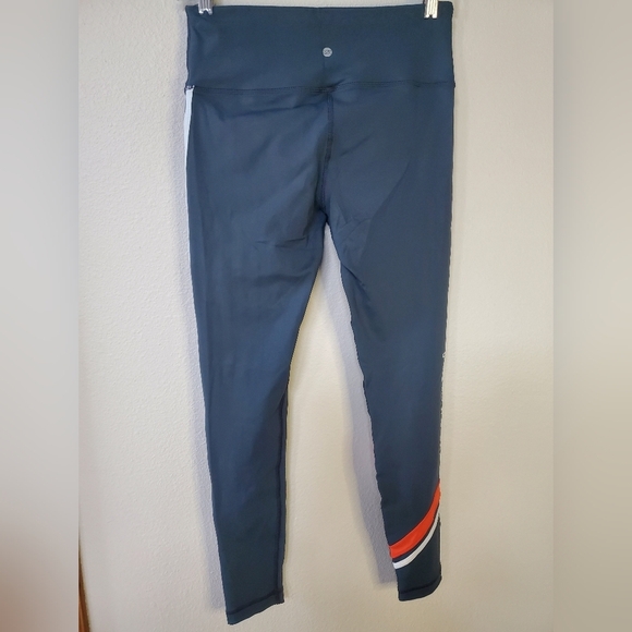 Peloton leggings, green with orange and white stripe. - Picture 4 of 4